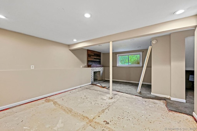 99 Redwood Dr, Bristol, CT 06010 - basement with baseboards, a fireplace, and recessed lighting