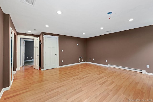 99 Redwood Dr, Bristol, CT 06010 - empty room with a baseboard radiator, baseboards, light wood-style floors, and recessed lighting