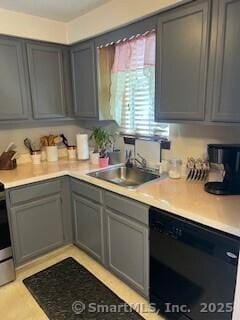 26 Guiel Pl Apt 5, Meriden, CT 06450 - kitchen featuring dishwasher, light countertops, a sink, and gray cabinetry