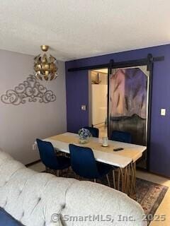 26 Guiel Pl Apt 5, Meriden, CT 06450 - dining room with a barn door