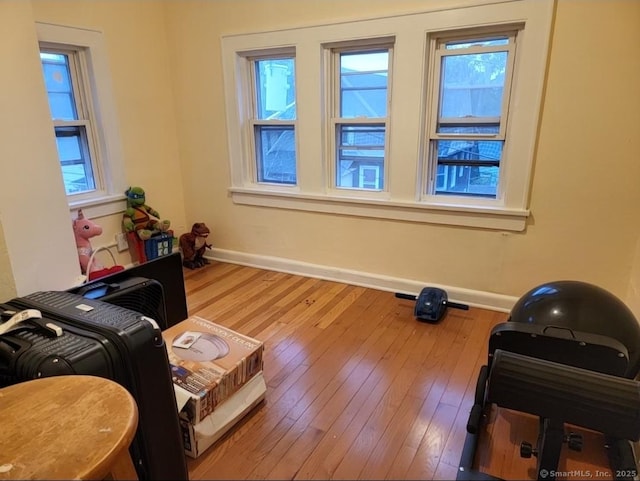 45 Washington Pl, Bridgeport, CT 06604 - living room featuring baseboards, hardwood / wood-style floors, and plenty of natural light