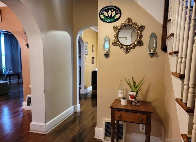45 Washington Pl, Bridgeport, CT 06604 - hall featuring hardwood / wood-style floors, baseboards, arched walkways, and crown molding