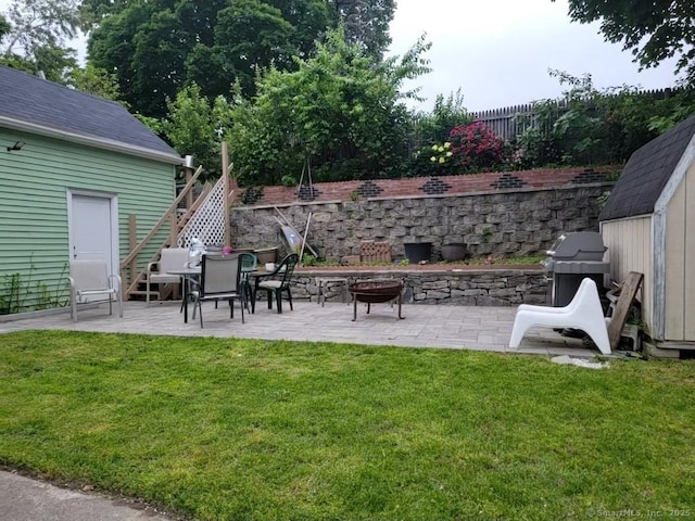 45 Washington Pl, Bridgeport, CT 06604 - view of yard featuring an outdoor fire pit, a patio area, and stairs