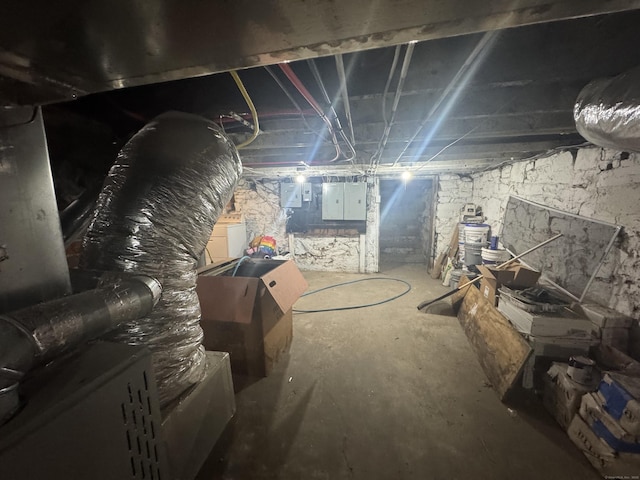 unfinished below grade area featuring electric panel