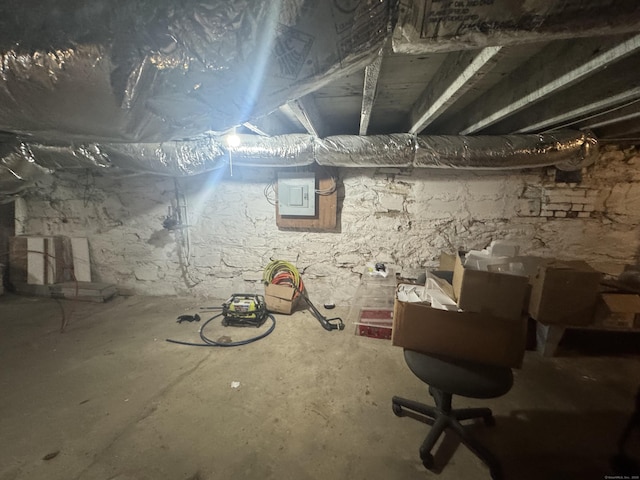 unfinished below grade area with electric panel