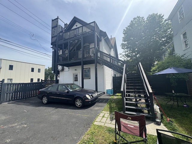 view of front of property featuring stairs