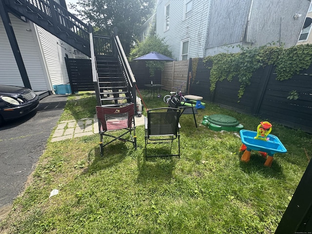 fenced backyard with stairway