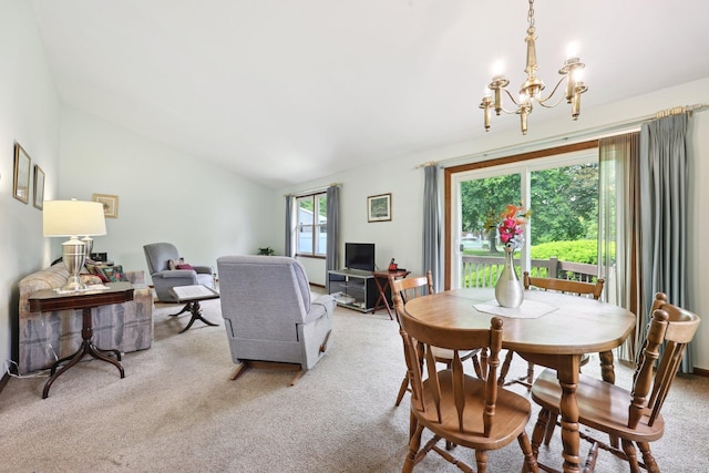 1277 New Britain Ave Unit 1277, West Hartford, CT 06110 - dining space with light colored carpet, a chandelier, and lofted ceiling