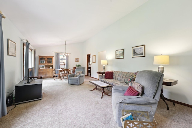 1277 New Britain Ave Unit 1277, West Hartford, CT 06110 - carpeted living room featuring vaulted ceiling, a chandelier, and baseboards