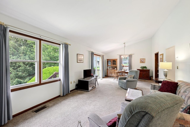 1277 New Britain Ave Unit 1277, West Hartford, CT 06110 - living room with light carpet, lofted ceiling, baseboards, and a chandelier