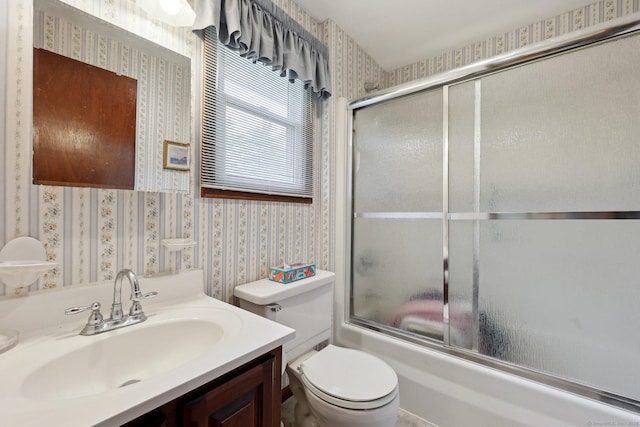 1277 New Britain Ave Unit 1277, West Hartford, CT 06110 - bathroom with wallpapered walls, combined bath / shower with glass door, vanity, and toilet