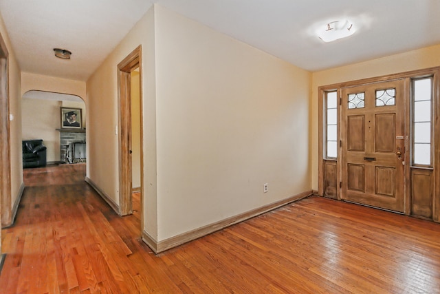 246 Ray Rd, New Haven, CT 06515 - entrance foyer with light wood-style flooring and arched walkways
