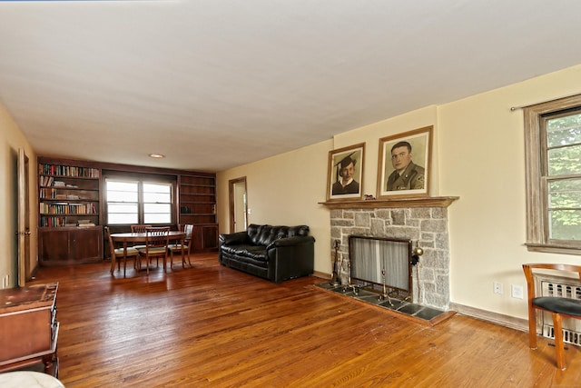 246 Ray Rd, New Haven, CT 06515 - living room featuring wood finished floors and a fireplace