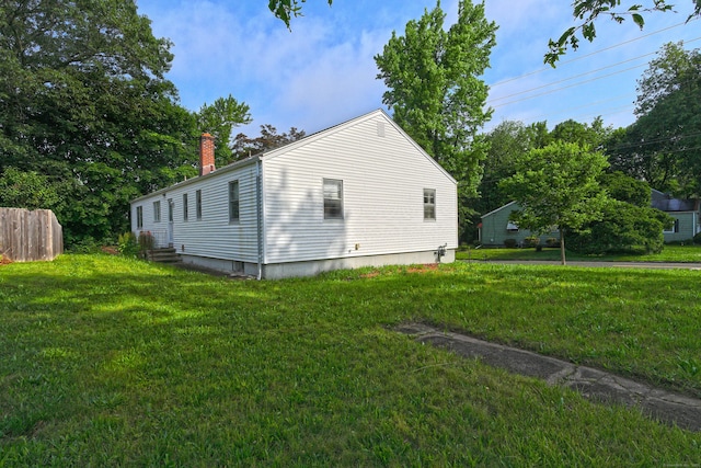 246 Ray Rd, New Haven, CT 06515 - view of side of home with a chimney