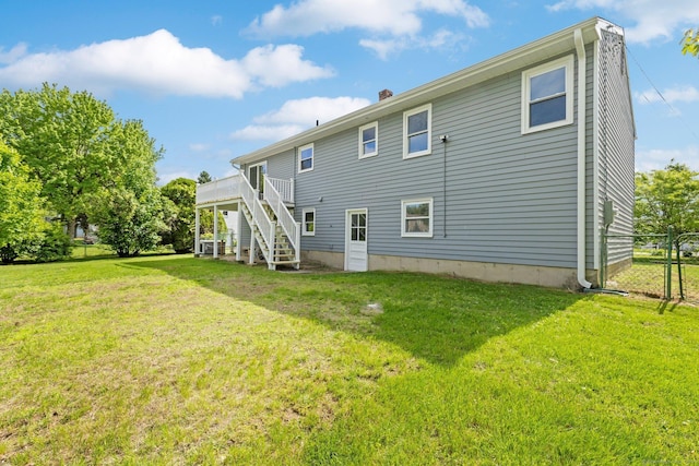 447 Palisado Ave, Windsor, CT 06095 - rear view of property featuring stairway, a chimney, and a deck