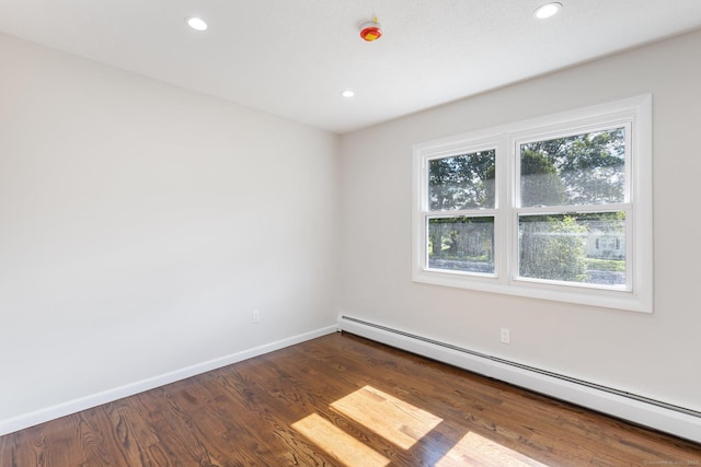 447 Palisado Ave, Windsor, CT 06095 - empty room featuring a baseboard radiator, baseboards, dark wood finished floors, and recessed lighting