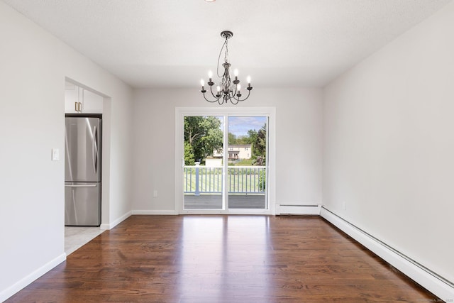 447 Palisado Ave, Windsor, CT 06095 - spare room featuring a chandelier, a baseboard heating unit, wood finished floors, and baseboards