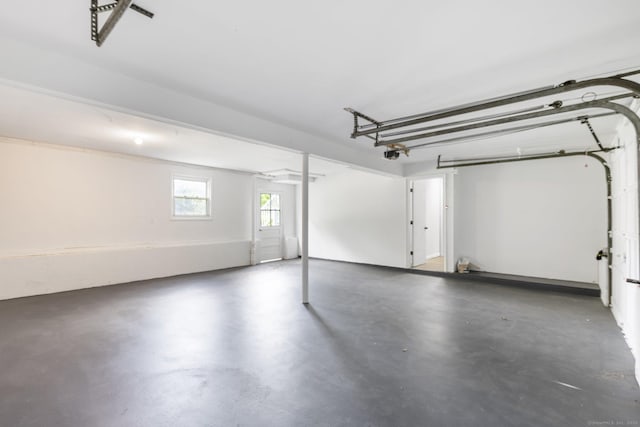 447 Palisado Ave, Windsor, CT 06095 - garage featuring a garage door opener