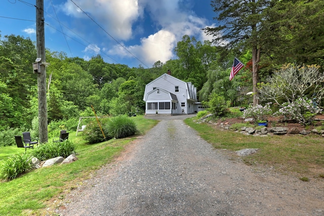 8 Whippoorwill Ln, Bethany, CT 06524 - view of front of house featuring dirt driveway, a gambrel roof, and a chimney