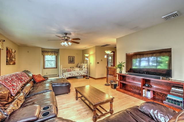 8 Whippoorwill Ln, Bethany, CT 06524 - living room featuring wood finished floors, a ceiling fan, baseboard heating, and baseboards