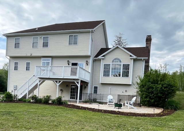 41 Mesa Dr, Bethany, CT 06524 - rear view of property featuring a fire pit, a lawn, a wooden deck, and a chimney