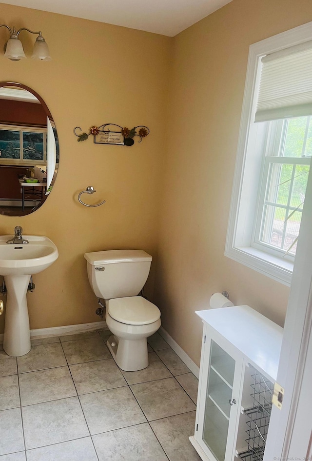 41 Mesa Dr, Bethany, CT 06524 - half bath featuring toilet, tile patterned flooring, and baseboards