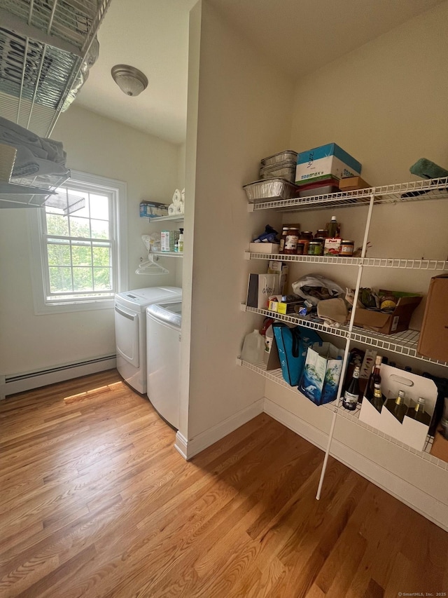 41 Mesa Dr, Bethany, CT 06524 - washroom with a baseboard radiator, wood finished floors, and washer and dryer