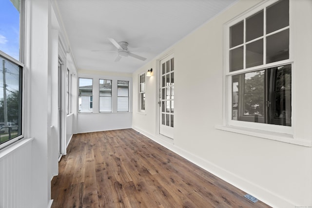 128 Grove Pl, West Haven, CT 06516 - unfurnished sunroom featuring wood finished floors and baseboards
