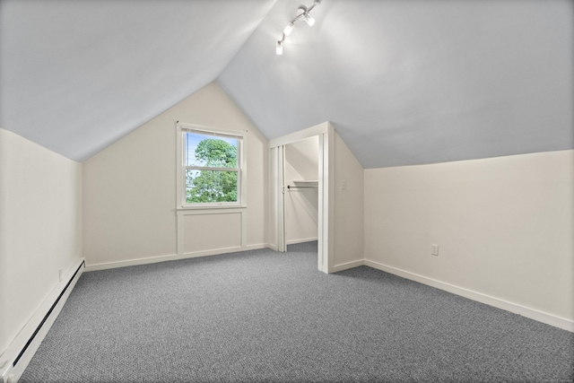 128 Grove Pl, West Haven, CT 06516 - bonus room featuring a baseboard heating unit, vaulted ceiling, carpet, and baseboards