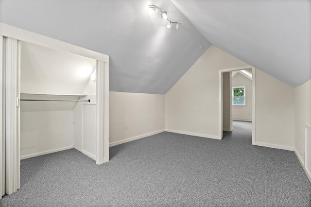 128 Grove Pl, West Haven, CT 06516 - bonus room with vaulted ceiling, carpet, and baseboards