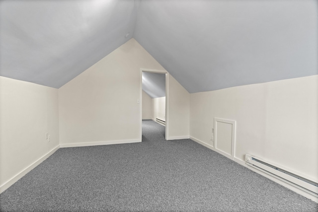 128 Grove Pl, West Haven, CT 06516 - bonus room featuring a baseboard heating unit, dark colored carpet, vaulted ceiling, and baseboards