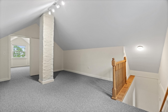 128 Grove Pl, West Haven, CT 06516 - additional living space with lofted ceiling, carpet, and baseboards