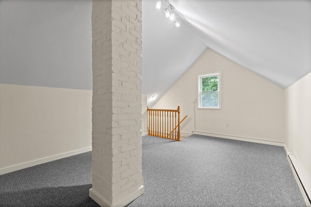128 Grove Pl, West Haven, CT 06516 - bonus room featuring a baseboard radiator, carpet, vaulted ceiling, and baseboards