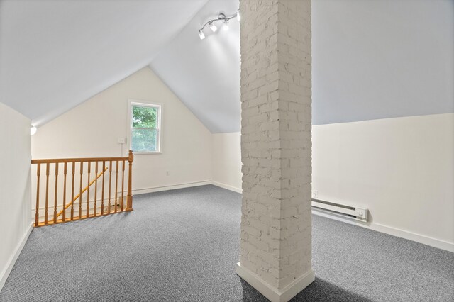 128 Grove Pl, West Haven, CT 06516 - additional living space with baseboard heating, carpet floors, lofted ceiling, and baseboards
