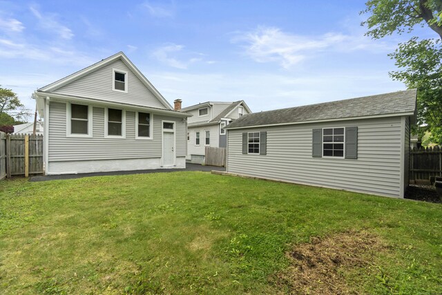 128 Grove Pl, West Haven, CT 06516 - rear view of house with an outdoor structure