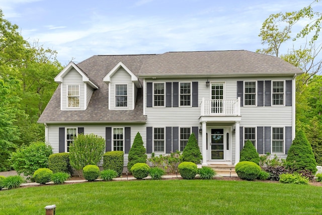 220 Bushy Hill Rd, Deep River, CT 06417 - view of front of property featuring a front lawn, a shingled roof, and a balcony