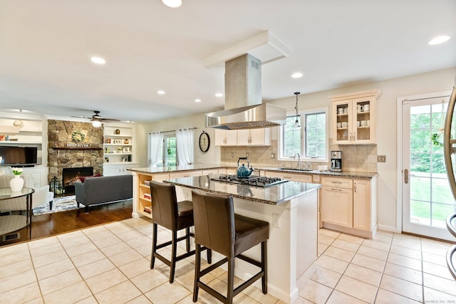 220 Bushy Hill Rd, Deep River, CT 06417 - kitchen featuring island range hood, a sink, a peninsula, stainless steel gas cooktop, and healthy amount of natural light