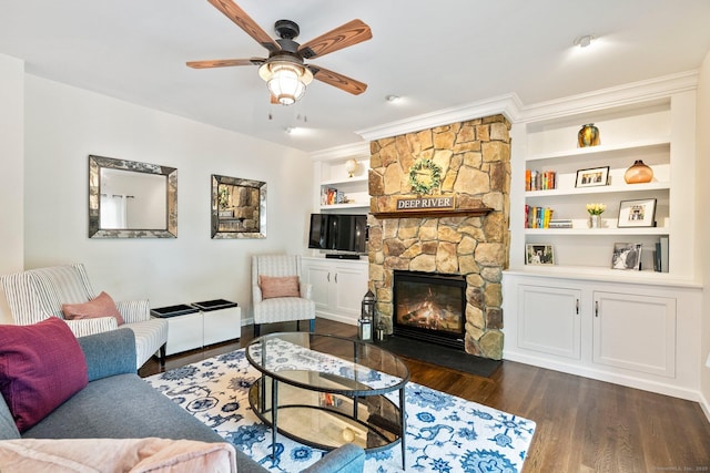 220 Bushy Hill Rd, Deep River, CT 06417 - living area featuring dark wood finished floors, a ceiling fan, a fireplace, and built in features
