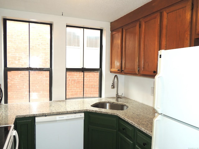 16 Essex St Unit 5F, Hartford, CT 06114 - kitchen with white appliances, a sink, and light stone counters