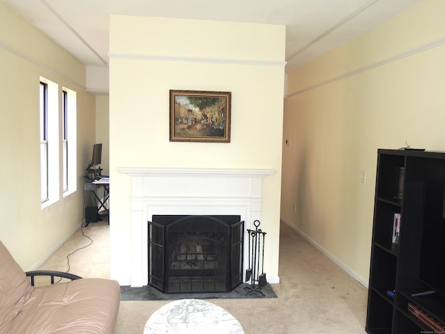 16 Essex St Unit 5F, Hartford, CT 06114 - living room featuring carpet and a fireplace with flush hearth
