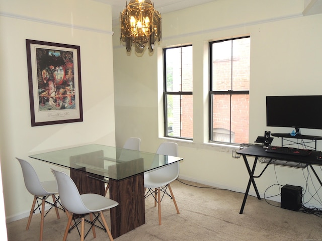16 Essex St Unit 5F, Hartford, CT 06114 - dining room featuring a chandelier, carpet flooring, and baseboards
