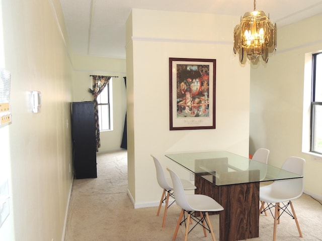 16 Essex St Unit 5F, Hartford, CT 06114 - dining space with carpet, a chandelier, and baseboards