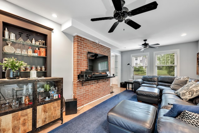 1 Stevens Rd, Middlebury, CT 06762 - living area featuring a wood stove, ceiling fan, and recessed lighting