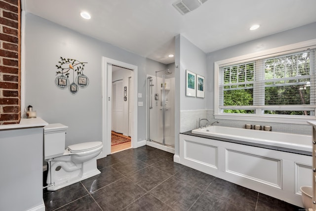 1 Stevens Rd, Middlebury, CT 06762 - full bath with a bath, a stall shower, toilet, tile patterned floors, and recessed lighting