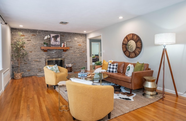 35 W Ridge Dr, West Hartford, CT 06117 - living area featuring wood finished floors, a fireplace, recessed lighting, baseboards, and radiator heating unit