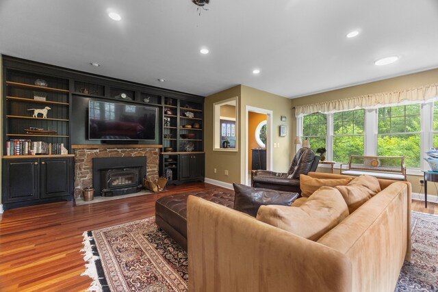 238 Park Rd, Oxford, CT 06478 - living area with wood finished floors, baseboards, plenty of natural light, recessed lighting, and a fireplace