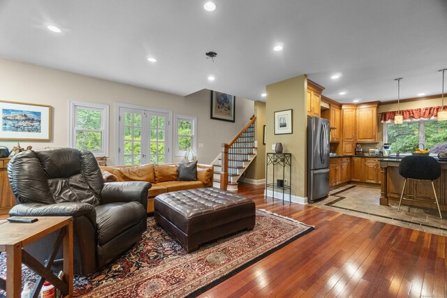 238 Park Rd, Oxford, CT 06478 - living area featuring light wood-style floors, baseboards, stairs, and recessed lighting