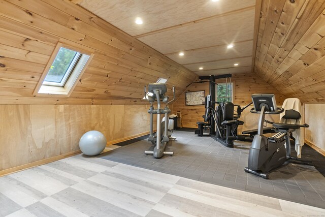 238 Park Rd, Oxford, CT 06478 - exercise room with a skylight, wood walls, wooden ceiling, vaulted ceiling, and baseboards