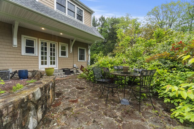 238 Park Rd, Oxford, CT 06478 - view of patio with french doors, central air condition unit, and outdoor dining area