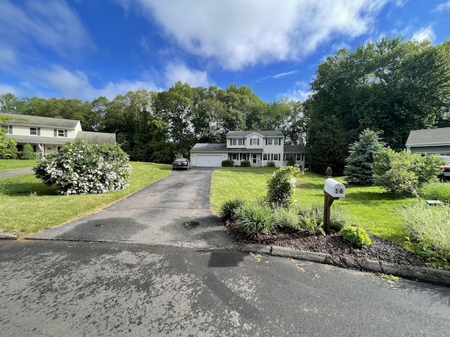 16 Mips Dr, Windsor, CT 06095 - view of front of house featuring a front lawn, asphalt driveway, and an attached garage